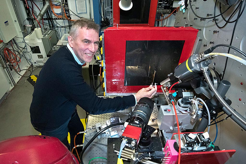 Image: Dr. Anatoly Frenkel next to the XPS powder diffraction beamline (Photo courtesy of BNL).