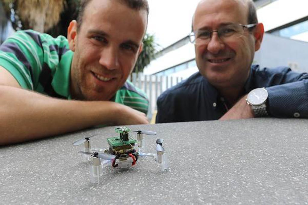 Image: Javier Burgués (L) and Santiago Marco (R), of UB and IBEC, and the nanodrone (Photo courtesy of IBEC).