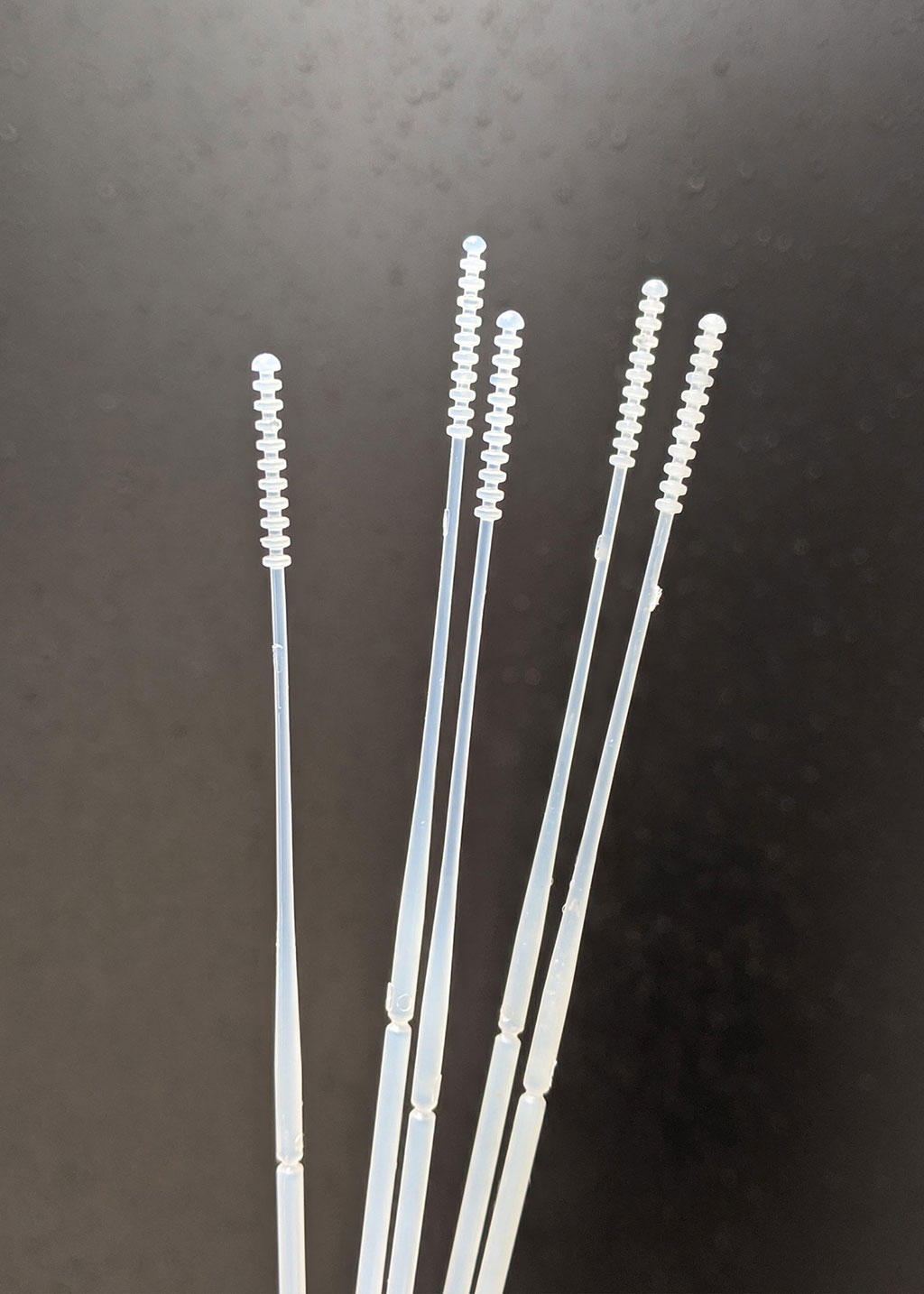 Image: Injection-molded nasopharyngeal swabs (Photo courtesy of Wyss Institute at Harvard University)