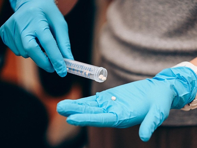 Image: A test tube contains the CitraBoneQMg bone implants used by researchers in the study (Photo courtesy of Caleb Craig/Penn State) Image: A test tube contains the CitraBoneQMg bone implants used by researchers in the study (Photo courtesy of Caleb Craig/Penn State)