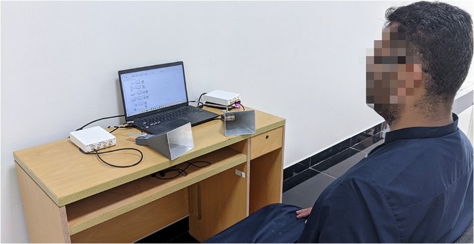 Image: The experimental setup used for acquisition of the OFDM-Breathe dataset (Photo courtesy of Communications Medicine)