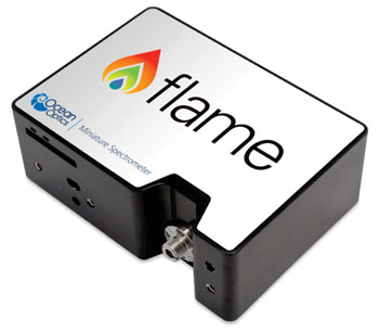 Image:  The Flame – a miniature spectrometer for medical diagnostics, biotechnology, and life sciences, that brings flexible optical sensing power to laboratory and point-of-care instrument integration (Photo courtesy of Ocean Optics).
