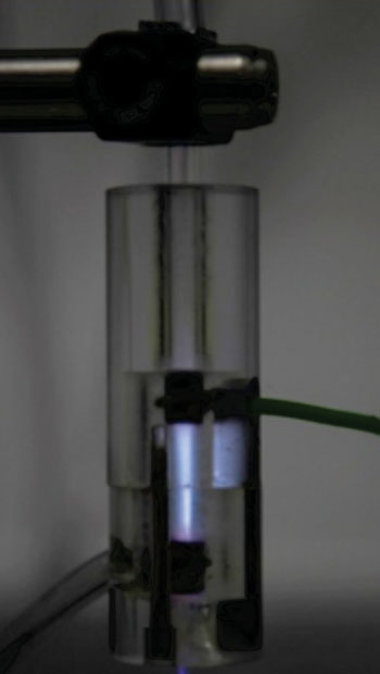 Image: Low-temperature plasmas are formed in a chamber like the one shown in the photo by applying a high electric field across a gas at atmospheric pressure and room temperature (Photo courtesy of the University of York).