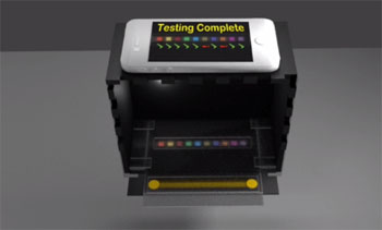 Image: The black box is part of an experimental urinalysis testing system meant to enable a smartphone camera to capture video that accurately analyzes color changes in a standard paper dipstick in order to detect conditions of medical interest (Photo courtesy of Stanford University).