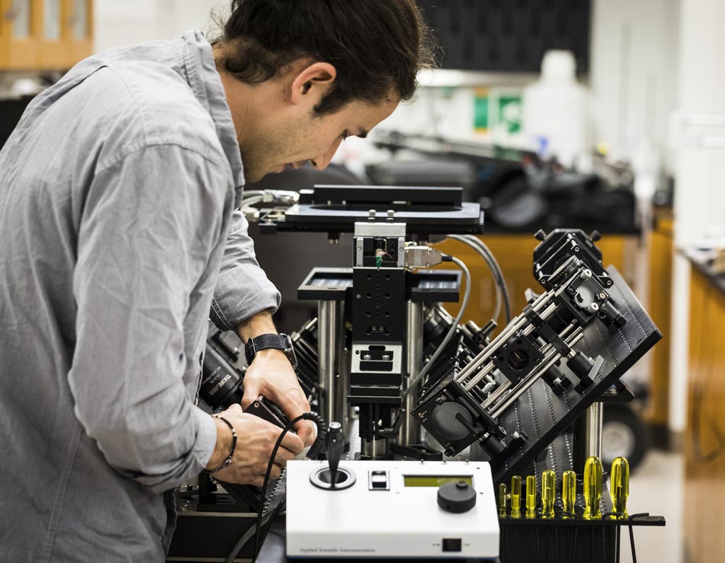 Image: A scientist adjusting the versatile light-sheet microscope that can provide surgeons with real-time pathology data to guide cancer-removal surgeries and can also non-destructively examine tumor biopsies in 3D (Photo courtesy of Mark Stone/University of Washington).