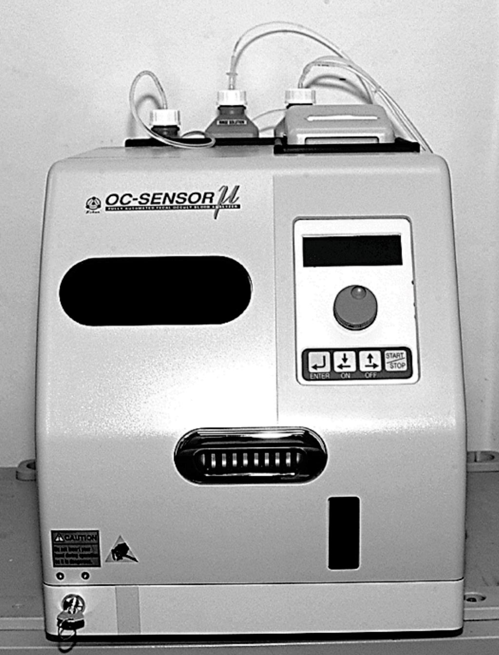 Image: The OC-Sensor apparatus used for the quantitative fecal immunochemical test screening for colorectal cancer (Photo courtesy of Eiken).