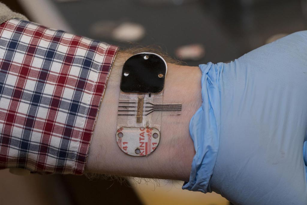 Image: The sensor stimulates sweat under a tiny patch, even when its wearer is cool and resting. The sensor can for a period of hours provide noninvasively the same information found in the blood (Photo courtesy of Joseph Fuqua, University of Cincinnati Creative Services).