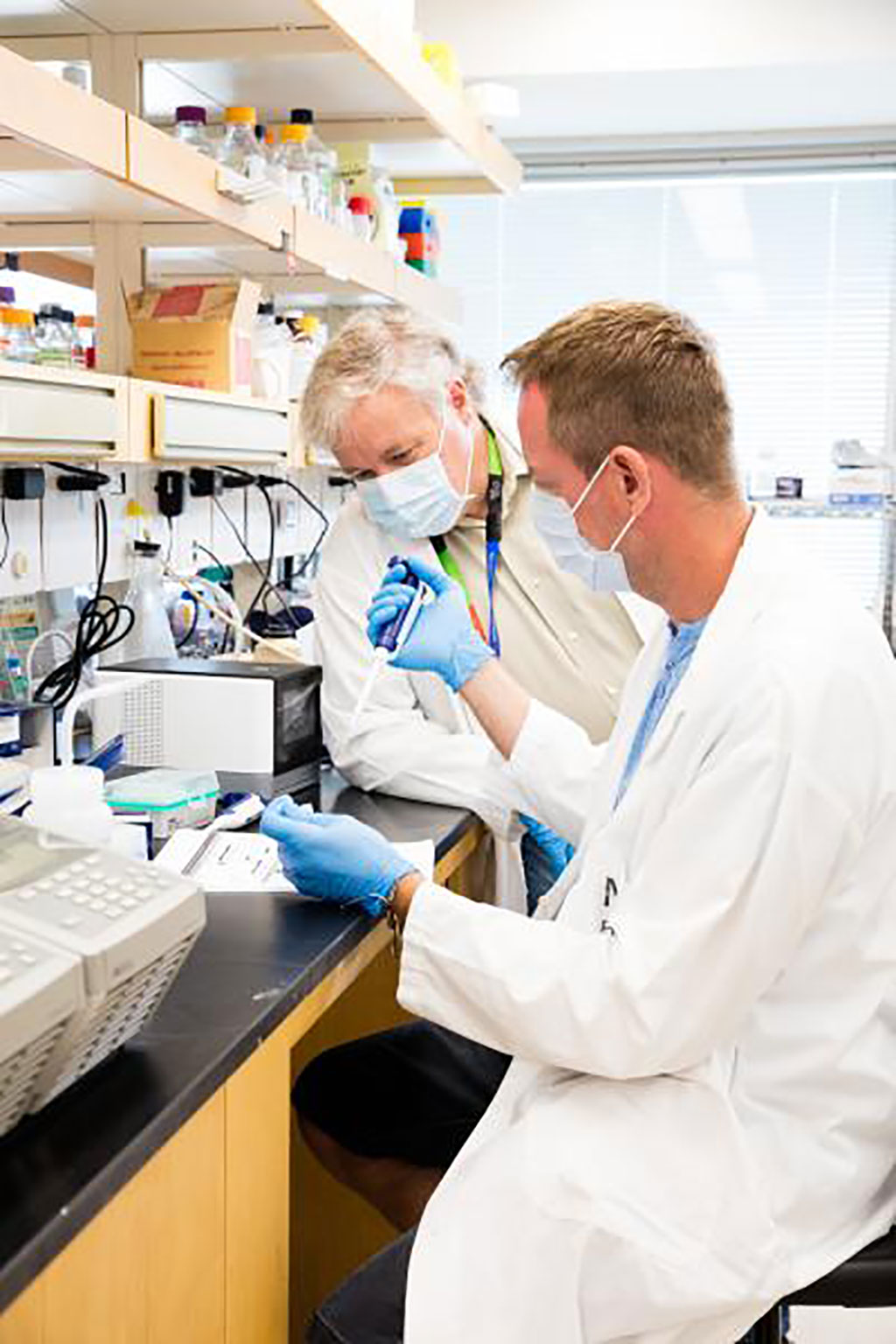 Image: Jeff Wrana, left, is seen in this undated file photo at the Lunenfeld-Tanenbaum Research Institute in Toronto, Canada (Photo courtesy of Sinai Health)