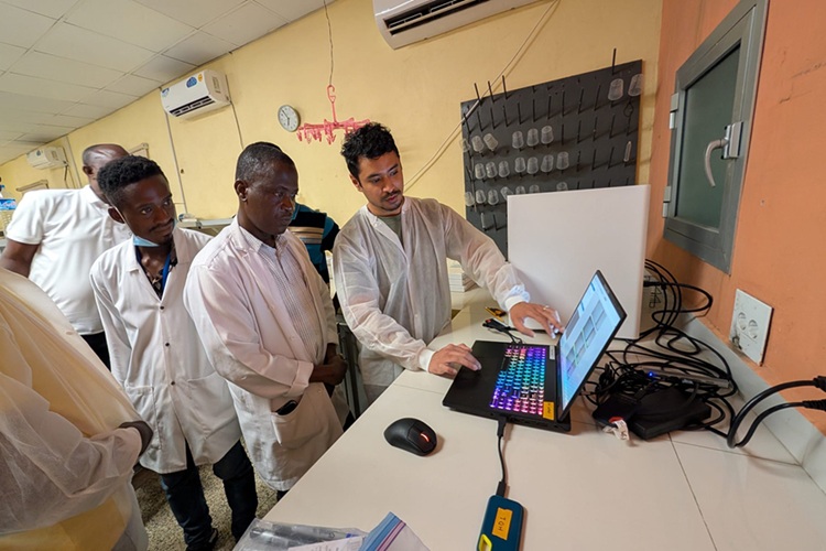 Image: A diagnostics training in Monrovia, Liberia, incorporates feedback from community health workers and doctors (Photo courtesy of Prakash lab)