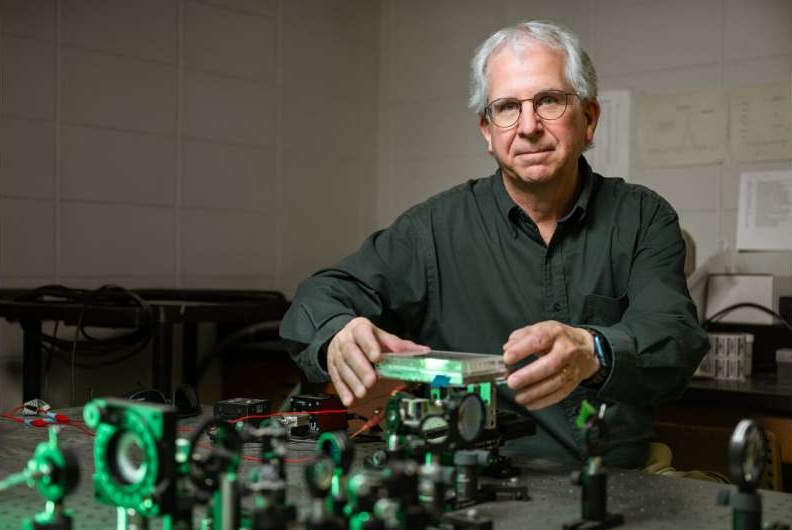 Image: Purdue University physicist David Nolte is developing a biodynamic imaging system that could improve the care of cancer patients undergoing chemotherapy. Nolte\'s system can rapidly evaluate the outcome of different chemotherapy drugs on patient biopsies (obtained during diagnosis), which could ensure patients get the chemotherapy treatment that would be most effective on their specific tumor. Right now, the system is being used at the Indiana University School of Medicine to evaluate the impact of experimental chemotherapy drugs on tumor cells derived from more than 30 osteosarcoma patients. It has also been used in clinical and preclinical trials. (IMage Credit: Purdue University/Kelsey Lefever) Image: Purdue University physicist David Nolte is developing a biodynamic imaging system that could improve the care of cancer patients undergoing chemotherapy. Nolte\'s system can rapidly evaluate the outcome of different chemotherapy drugs on patient biopsies (obtained during diagnosis), which could ensure patients get the chemotherapy treatment that would be most effective on their specific tumor. Right now, the system is being used at the Indiana University School of Medicine to evaluate the impact of experimental chemotherapy drugs on tumor cells derived from more than 30 osteosarcoma patients. It has also been used in clinical and preclinical trials. (IMage Credit: Purdue University/Kelsey Lefever)