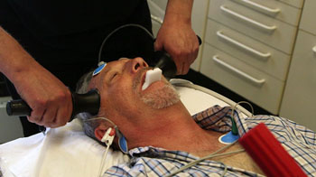 Image: A patient undergoing ECT treatment, which involves using small electric currents to trigger a short seizure in the brain (Photo courtesy of BBC Newsnight).
