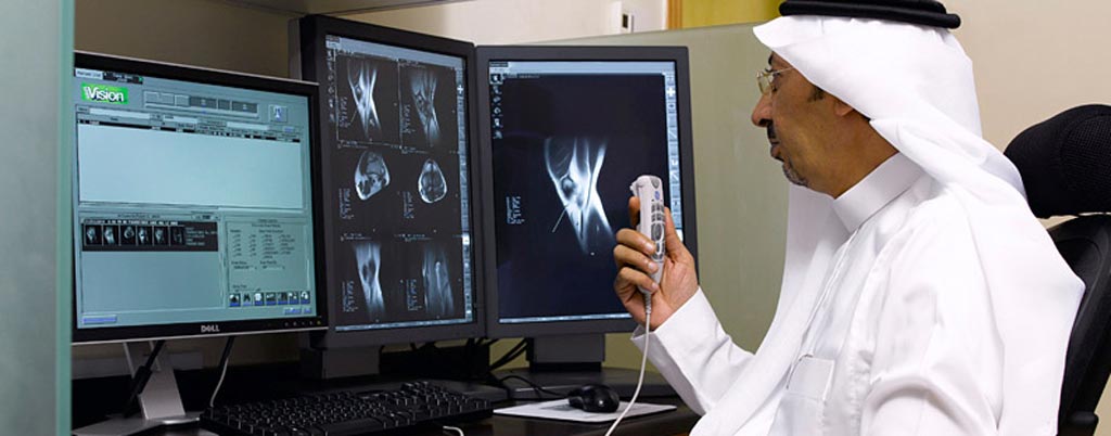Image: A radiologist using a teleradiology system to provide remote interpretation of imaging scans (Photo courtesy of Tamer Teleradiology).