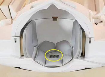 Image: The self-powered sensor (circled in yellow) attached to a headrest within an MRI machine detects patient movement in real time (Photo courtesy of ACS Sensors 2024, DOI: 10.1021/acssensors.4c00319)