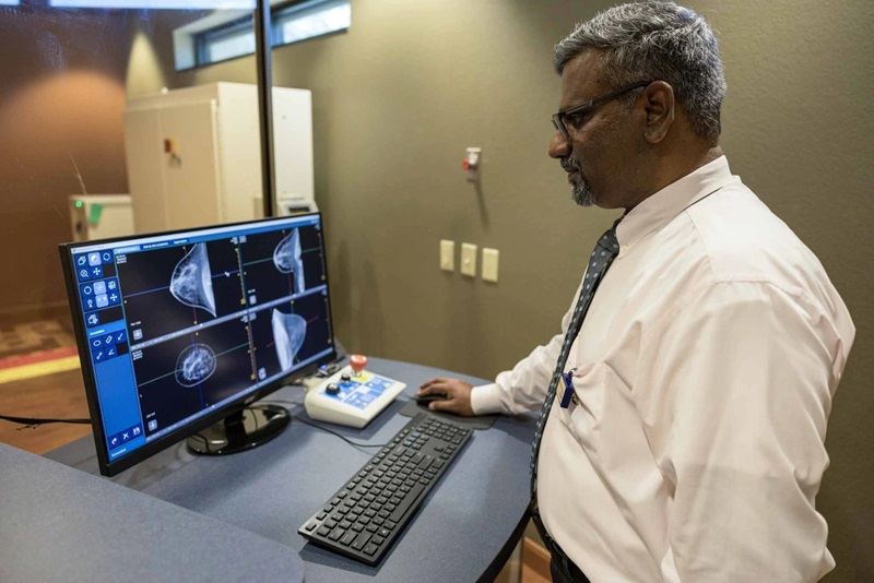 Image: The CT scanner prototype eliminates the need for physical compression of the breast (Photo courtesy of Quion Lowe and Lisa Dahm/U of A Cancer Center)